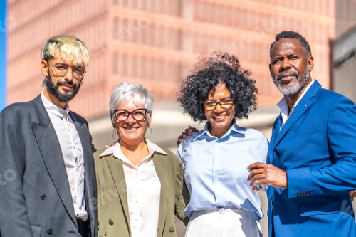 Preview: Multi-ethnic business people smiling at camera standing outdoors