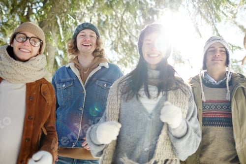 Preview: Friends Enjoying Walk in Winter Forest