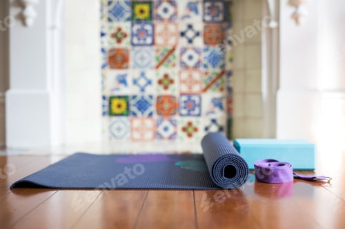 Preview: Yoga Mat, Block, and Strap on Wooden Floor