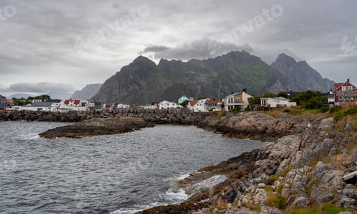 Preview: Henningsvaer fishing village in lofoten islands, norway, under cloudy sky