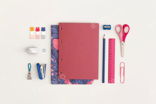 Preview: School stationery on red background. Top view with copy space.