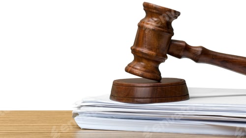 Preview: judge hammer on white paper and table