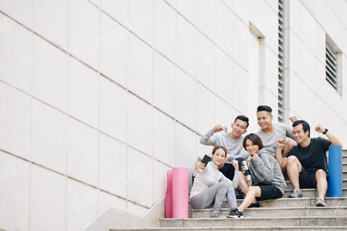 Preview: Excited people after sports training