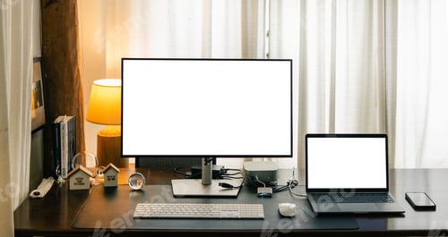 Preview: Desktop and laptop computers on a home desk, mockup screen