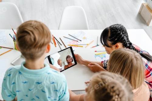 Preview: White teacher taking selfie on tablet computer with students
