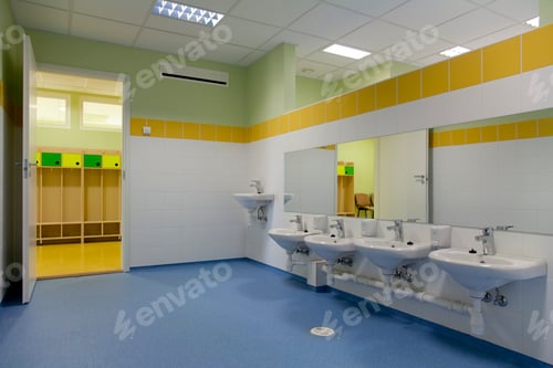 Preview: School Restroom, modern style with yellow paint and blue flooring