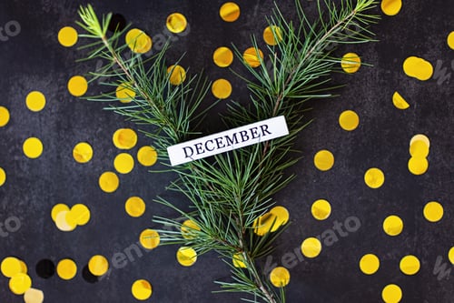 Preview: Creative Festive Flat Lay With Word December And Fir Branch on Black Background With Confetti