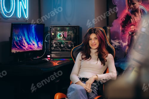 Preview: Fasionable Female Gamer Winning in Online Video Game on Computer. Portrait of Young Stylish Woman