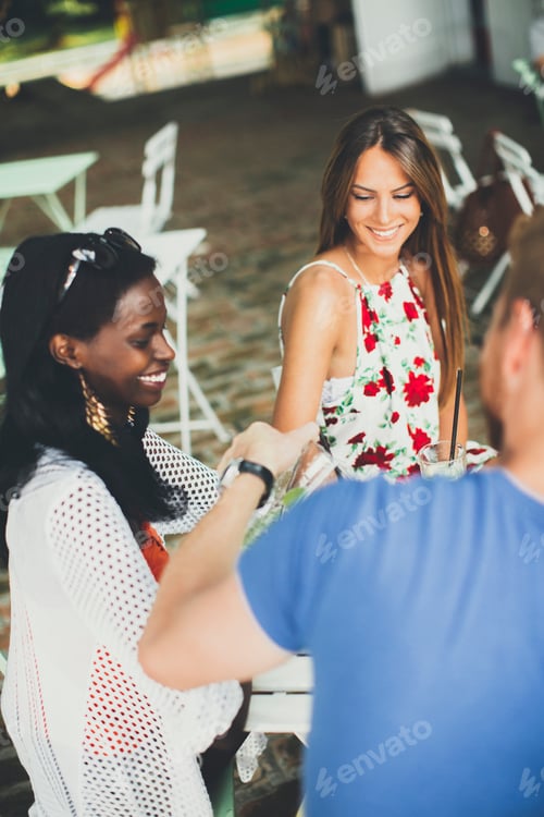 Preview: Young people in the cafe at summer