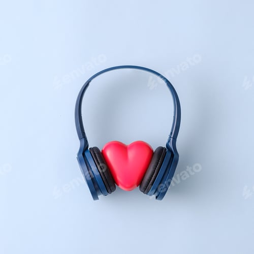 Preview: Trendy romantic concept with party headphones and heart listening to disco. Minimal creative idea.