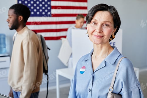 Preview: Smiling Adult Woman at Voting Station