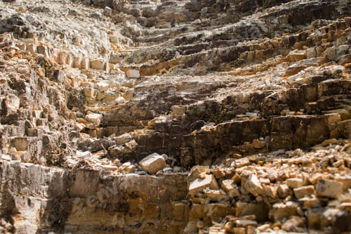 Preview: Scenic view of a rocky hill with an array of broken rocks scattered across