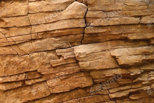 Preview: Light coarse natural rock stone background. Mining cliff rough front surface
