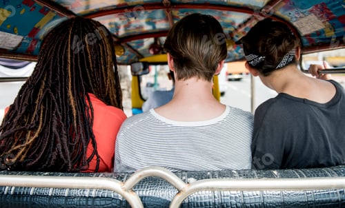 Vista previa: Group of tourists enjoying a tuk tuk ride