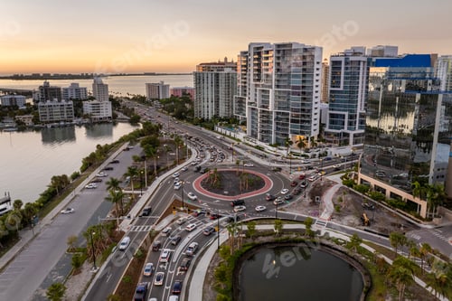Preview: Driving traffic cars at Gulfstream Avenue roundabout intersection.