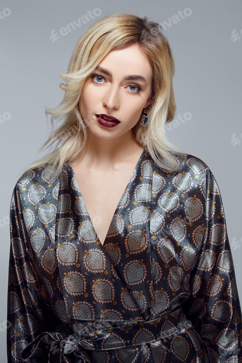 Preview: Attractive lady with long curly hair, clean fresh skin