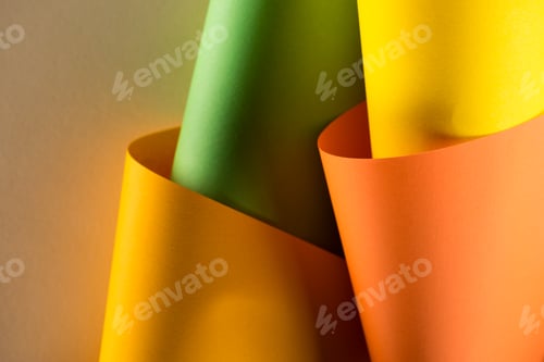 Preview: close-up shot of rolled colorful papers for background