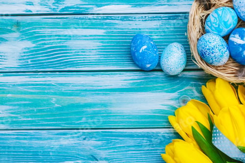 Preview: Easter eggs and tulips. Festive decoration on wood background. Holiday card with copy space