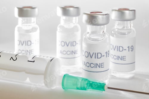 Preview: COVID-19 Vaccine Vials and Syringe Close Up