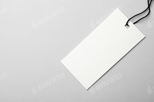 Preview: Cardboard tag with space for text on light background, top view