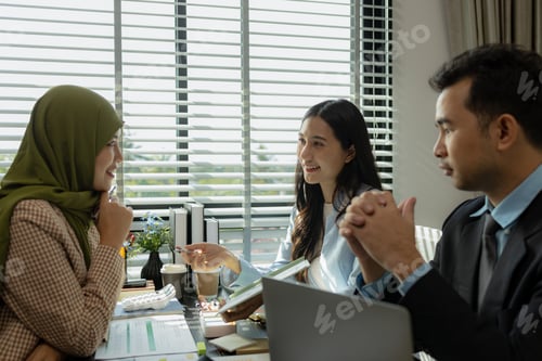 Preview: group of businessmen are discussing in an office. businessmen of different culture are meeting to ma