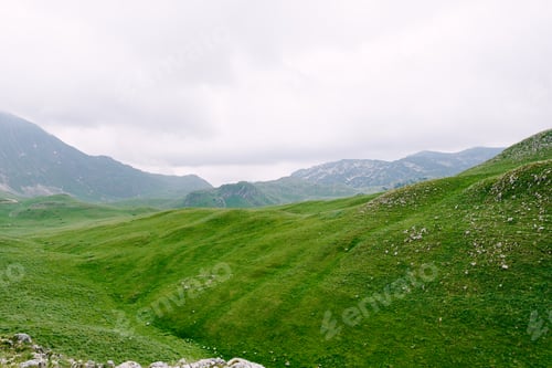 Preview: Cloudy sky over mountains in Durmitor National Park. Montenegro