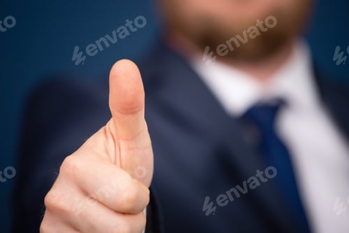 Preview: Business man shows thumb up