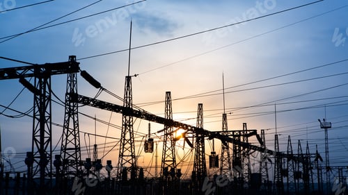 Preview: 4K time lapse. Silhouette of a network at transformer station in sunset, high voltage station