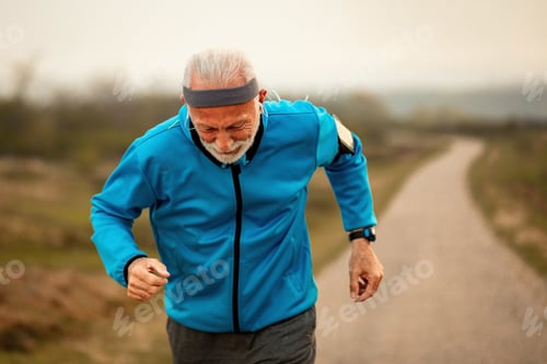 Preview: Senior Athletic Man Jogging In The Morning In Nature.