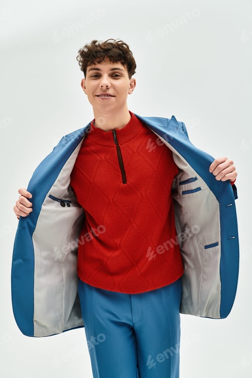 Preview: Stylish man showcases vibrant fashion choices with confidence in modern setting
