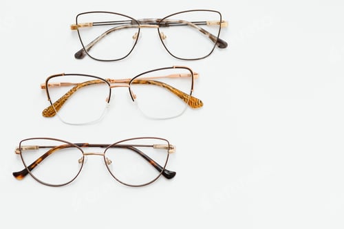 Preview: Stylish eyeglasses over background. Optical store, glasses selection, eye test