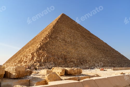 Preview: Exploring the grandeur of the Great Pyramid of Giza under a clear blue sky