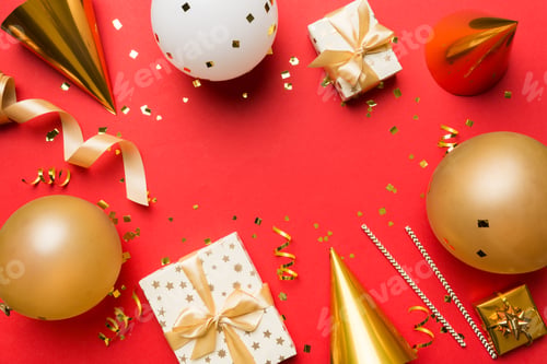 Preview: Holiday background with colorful balloon, gift and confetti. Flat lay style.