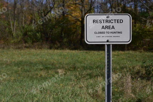 Preview: Signboard in the forest forbidding to hunt in this area