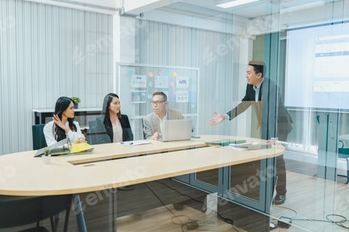 Preview: Professional diverse business people having collaboration team meeting, research strategy in company