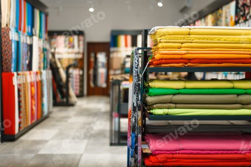 Preview: Fabric on shelves in textile store, nobody