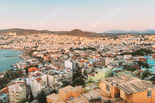 Preview: Kusadasi, Aydin Province, Turkey. Old Residential Houses And Kusadasi Cityscape In Sunny Summer Day