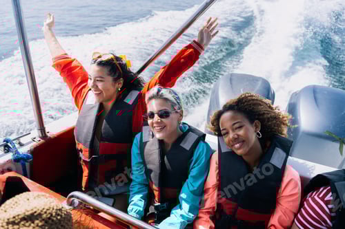 Preview: Multiethnic friends enjoying boat trip in peru