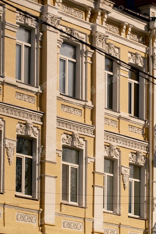 Preview: close-up street ancient houses a old windows and balconies Soviet architecture pastel colors of