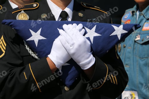 Preview: Minimalist image of military personnel carrying folded American flag to a Gold Star family member.