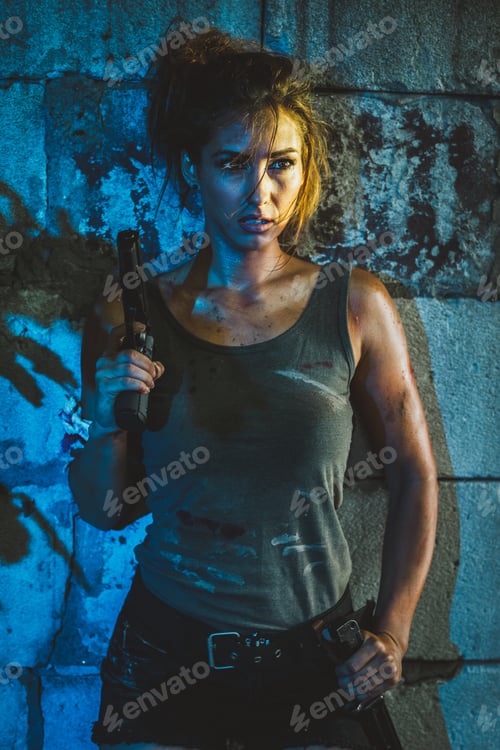 Preview: A Woman Leaning Against a Wall with a Gun