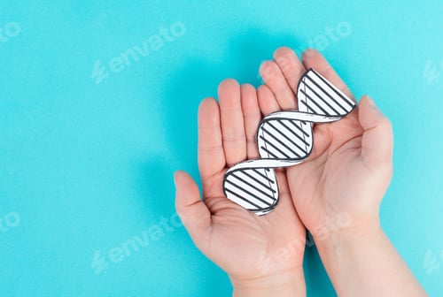 Preview: Holding a DNA strand in the hand, genetic therapy and treatment, biotechnology in mordern medicine,