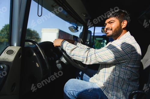 Preview: Indian truck driver smiling inside vehicle cab