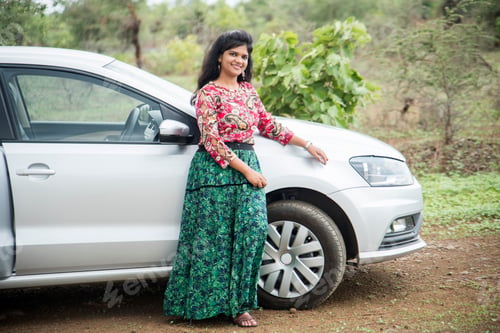 Preview: Beautiful young girl with car