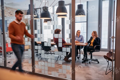 Preview: In the dynamic hustle and bustle of a business environment, a group of young business professionals