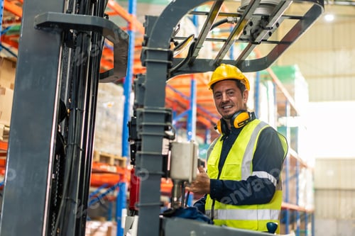 Preview: Portrait of Caucasian industrial worker working in manufacturing plant.