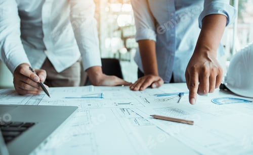 Preview: architect working at construction site and compass drawing pointing on blueprint