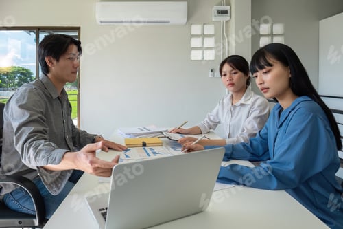 Preview: A professional business team is meeting to discuss company management practices in a modern