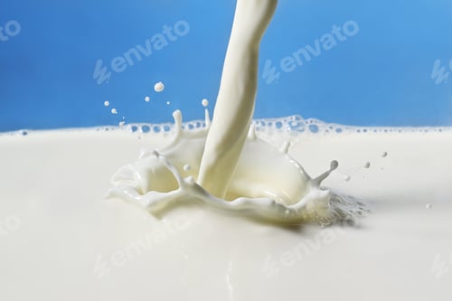 Preview: Pouring milk splash close up