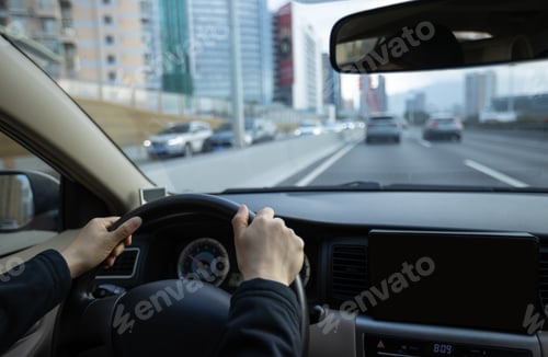 Preview: People driving car on city road